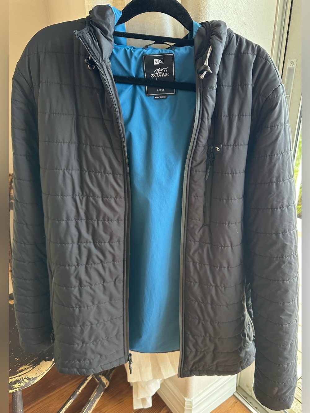 Rip Curl Men's Black Puffer Jacket with Blue Lining